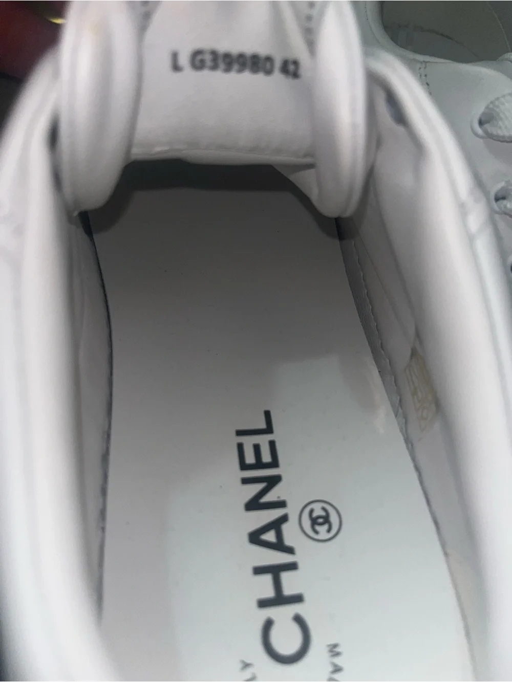 CHANEL White Leather Sneakers with Red CC and Black Panel